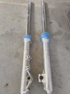 1983-1985 Honda ATC200X Front Forks Slightly Bent. Fixed Price $185.00.