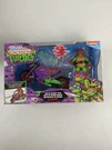 Teenage Mutant Ninja Turtles: Purple Dragon Cycle With Raphael Bran Dew (T35). Fixed Price $39.90.