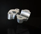 Kawasaki Z1-900 Z2 H1 H2 KH500 Front Axle Holder 44063-003 (pair). Fixed Price $55.00.
