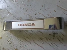 1984 Honda VF500C V30 Magna Lower Fork Cover Emblem 61401-MJ8-000. Fixed Price $39.95.