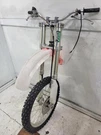 1997 Honda CR125R Front Forks Suspension Shock Leg Tube W/ Wheel Rim. Fixed Price $760.00.