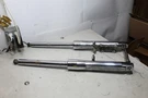 91-99 Harley Dyna Softail Chrome Billet Aftermarket Fork Set Pitted. Fixed Price $400.00.