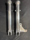 97-4399 97-4579 Polished Lower / Outer Set Triumph 750 TR7 T140 T150 1973 1979. Fixed Price $199.00.