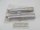 Pair Of Showa Harley Davidson Genuine Touring Fork Sliders R46497-02A L46537-02A. Fixed Price $74.99.