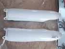 New Oem Yamaha YZ450F YZ125 Lower Fork Guards. Fixed Price $48.95.
