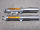 Harley '00-'06 Flstc Lower Fork Legs, 45917-07, 45918-00, Nice Shape, Used #4233. Fixed Price $75.00.