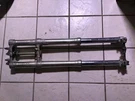 1991 Suzuki Front Forks Suspension Triple Tree Axle End. Fixed Price $180.00.