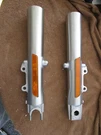 Harley-davidson 41MM Fork Sliders 46495-09 46502-09 W/ Upper Covers. Fixed Price $150.00.