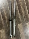 1976 Suzuki RV125 Front Forks Pair Oem Tubes & Sliders Needs Dust Seal. Fixed Price $130.00.