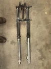 83,84 Honda XL-200R Oem Front Forks And Triple Clamps, 51400-KG1-003. Fixed Price $100.00.